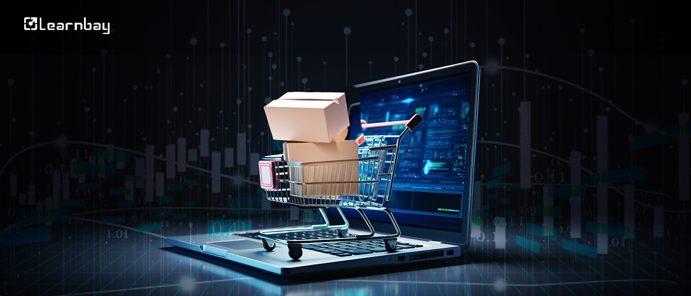 An image with a laptop, shopping cart and boxes shows a sales prediction for E-commerce firms.