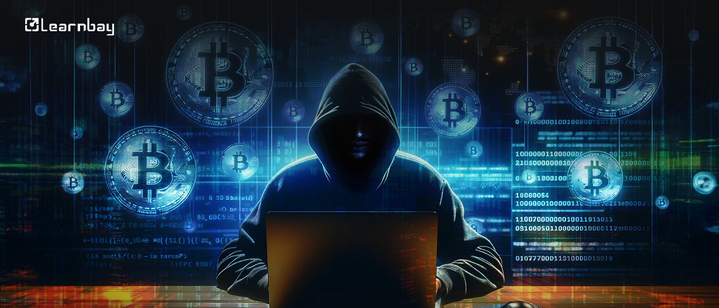 An image shows a man sitting with a laptop using Malware Causing Cryptocurrency Theft.