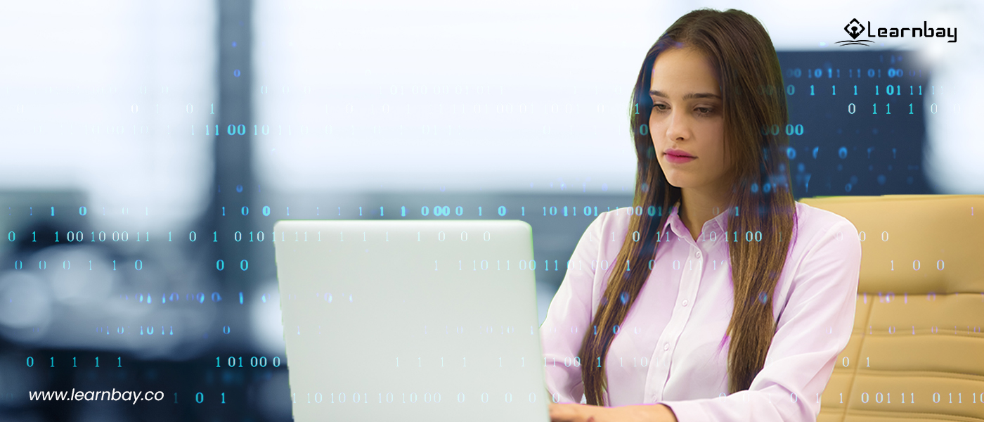 A girl seated on an executive chair using a Laptop.